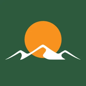 Icon option C: mountains under an orange sun on forest green